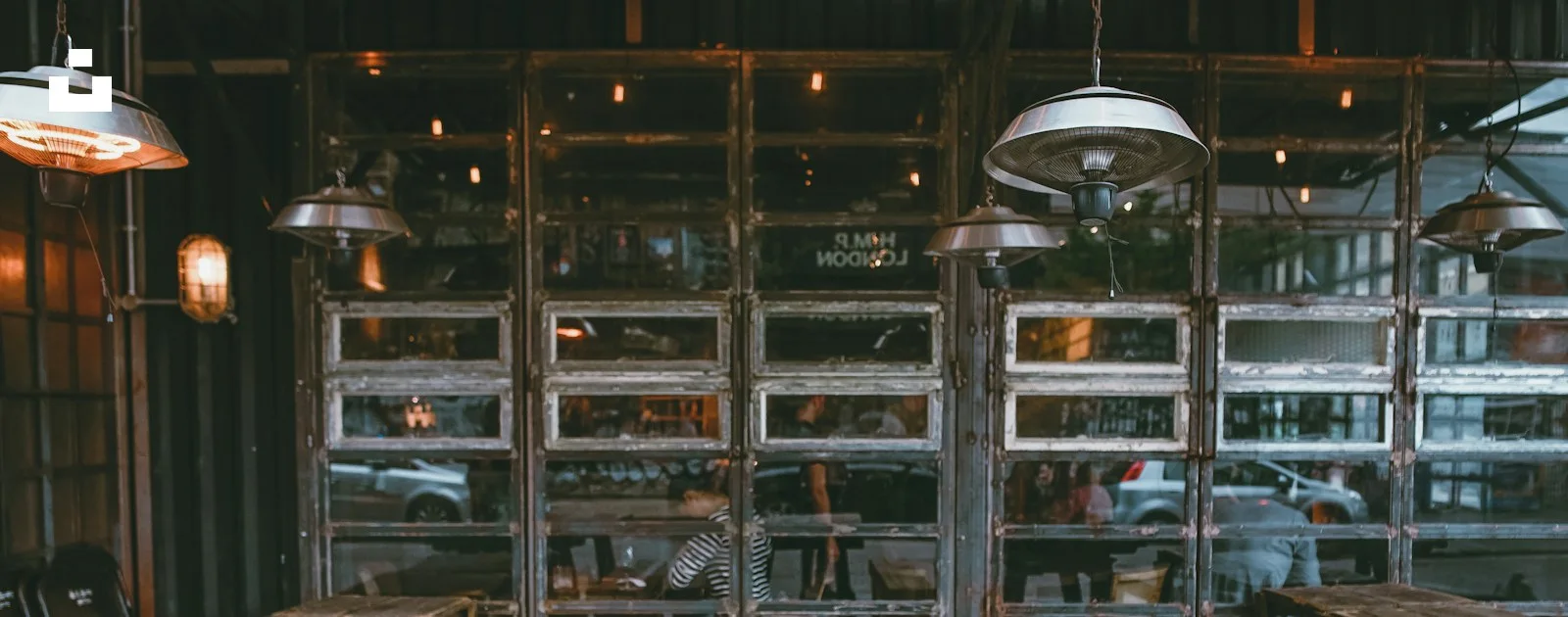 Daylight through the windows of a restaurant dining area